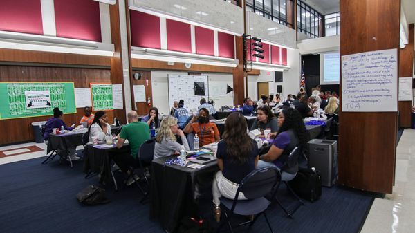 Staff members learning